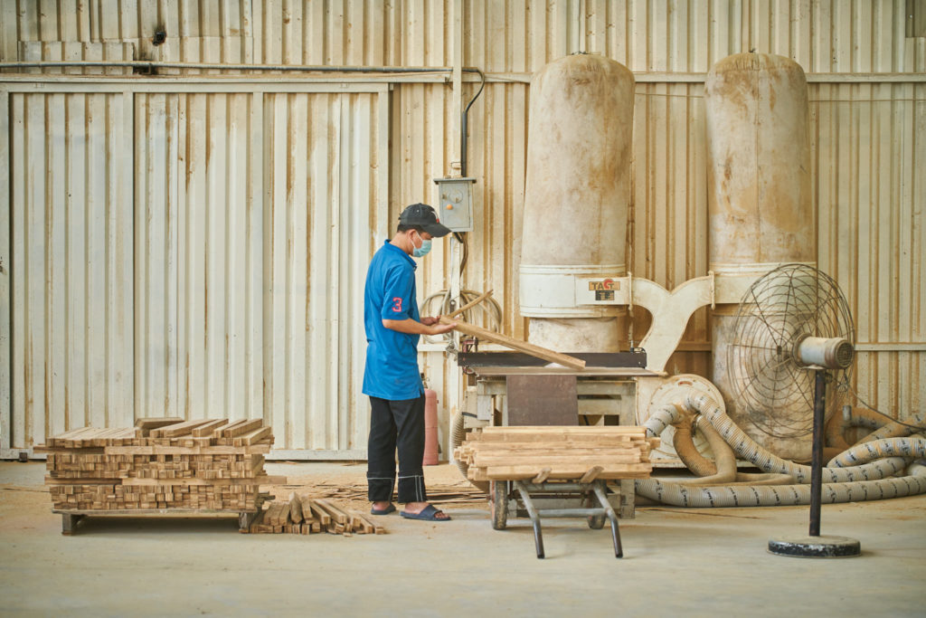 Portrait of a female bamboo artisan at the Bamboo Living workshop